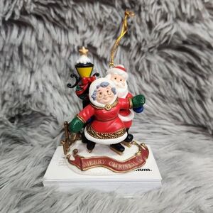 Festive Santa and Mrs. Claus Ornament
